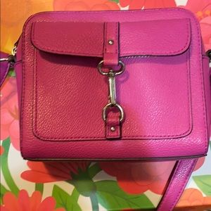 Small pink bag with adjustable strap